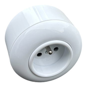 Enchufe con toma de tierra y marco 2P+T redondo de superficie blanco brillo